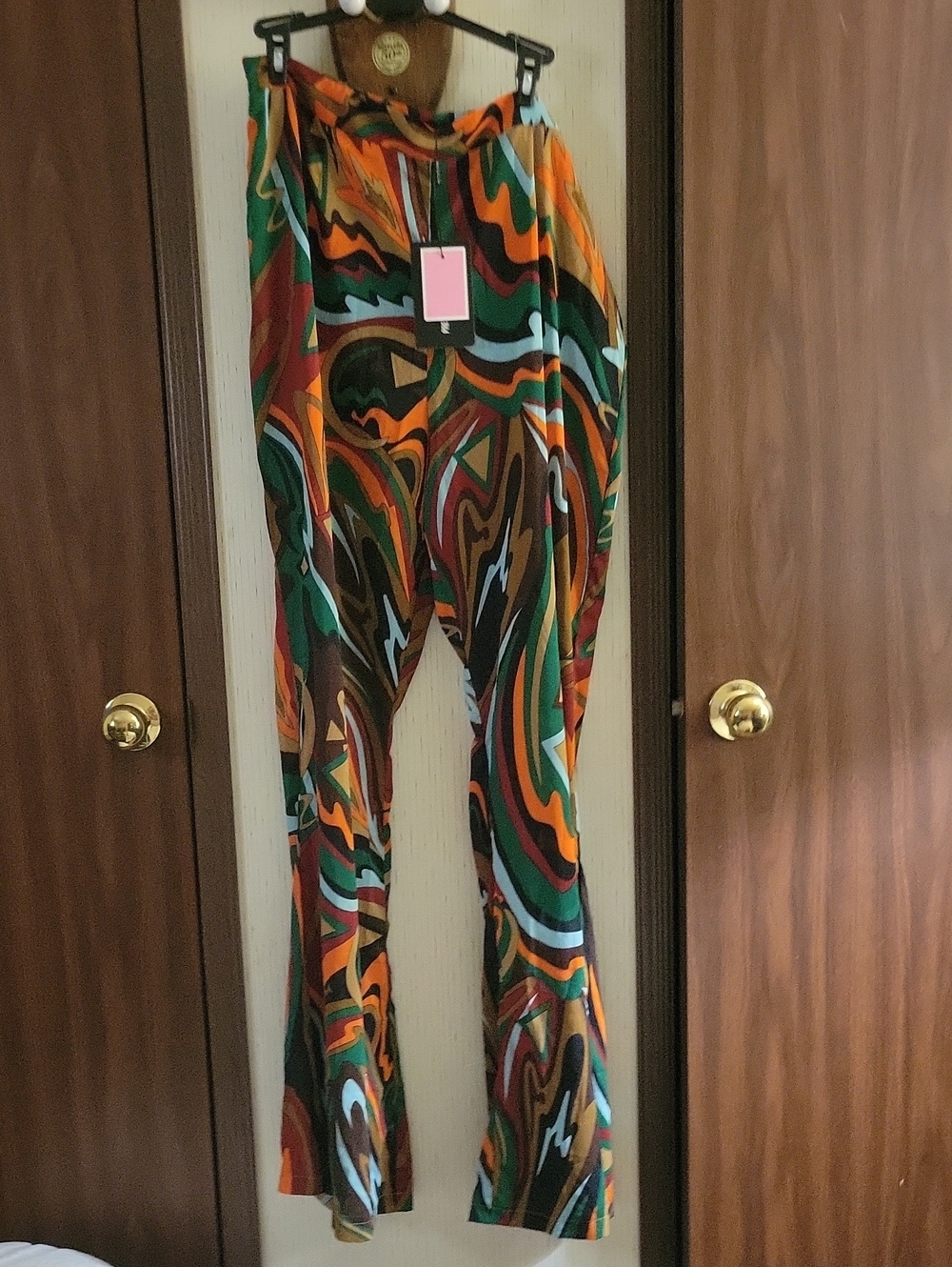 PrettyLittleThing Green, Orange & Brown Swirl Flare Pants